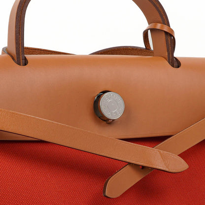 Hermes Herbag Zip 31 PM Fauve Vache Hunter Capucine Canvas mit Palladium Beschlägen