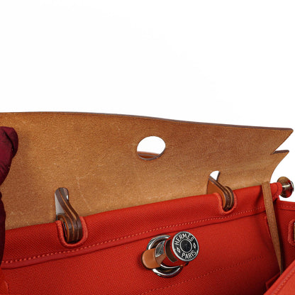 Hermes Herbag Zip 31 PM Fauve Vache Hunter Capucine Canvas mit Palladium Beschlägen
