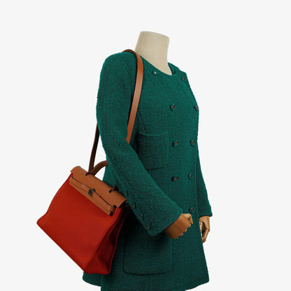 Hermes Herbag Zip 31 PM Fauve Vache Hunter Capucine Canvas mit Palladium Beschlägen