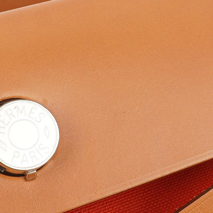 Hermes Herbag Zip 31 PM Fauve Vache Hunter Capucine Canvas mit Palladium Beschlägen