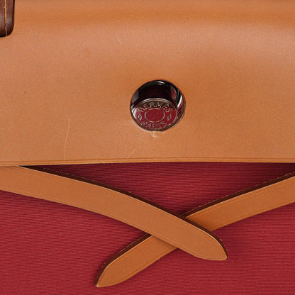 Hermès Herbag Zip 31 PM aus Fauve Vache Hunter und Rubis Toile mit Palladium-Beschlägen