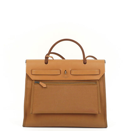 Hermès Herbag Zip 31 PM aus Vache Hunter Canvas in Dune/Sable Naturel und Orange mit Palladium-Hardware