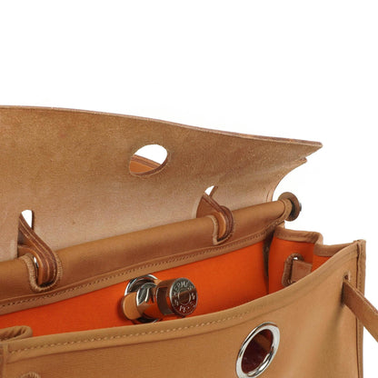 Hermès Herbag Zip 31 PM aus Vache Hunter Canvas in Dune/Sable Naturel und Orange mit Palladium-Hardware