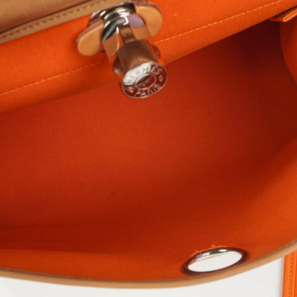 Hermès Herbag Zip 31 PM aus Vache Hunter Canvas in Dune/Sable Naturel und Orange mit Palladium-Hardware