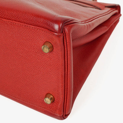 Hermès Kelly 32 Retourne in Rouge Vif mit Goldbeschlägen