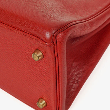 Hermès Kelly 32 Retourne in Rouge Vif mit Goldbeschlägen