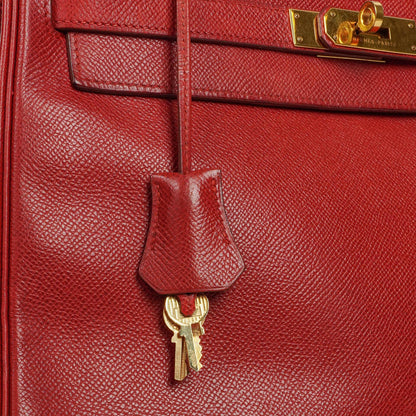 Hermès Kelly 32 Retourne in Rouge Vif mit Goldbeschlägen