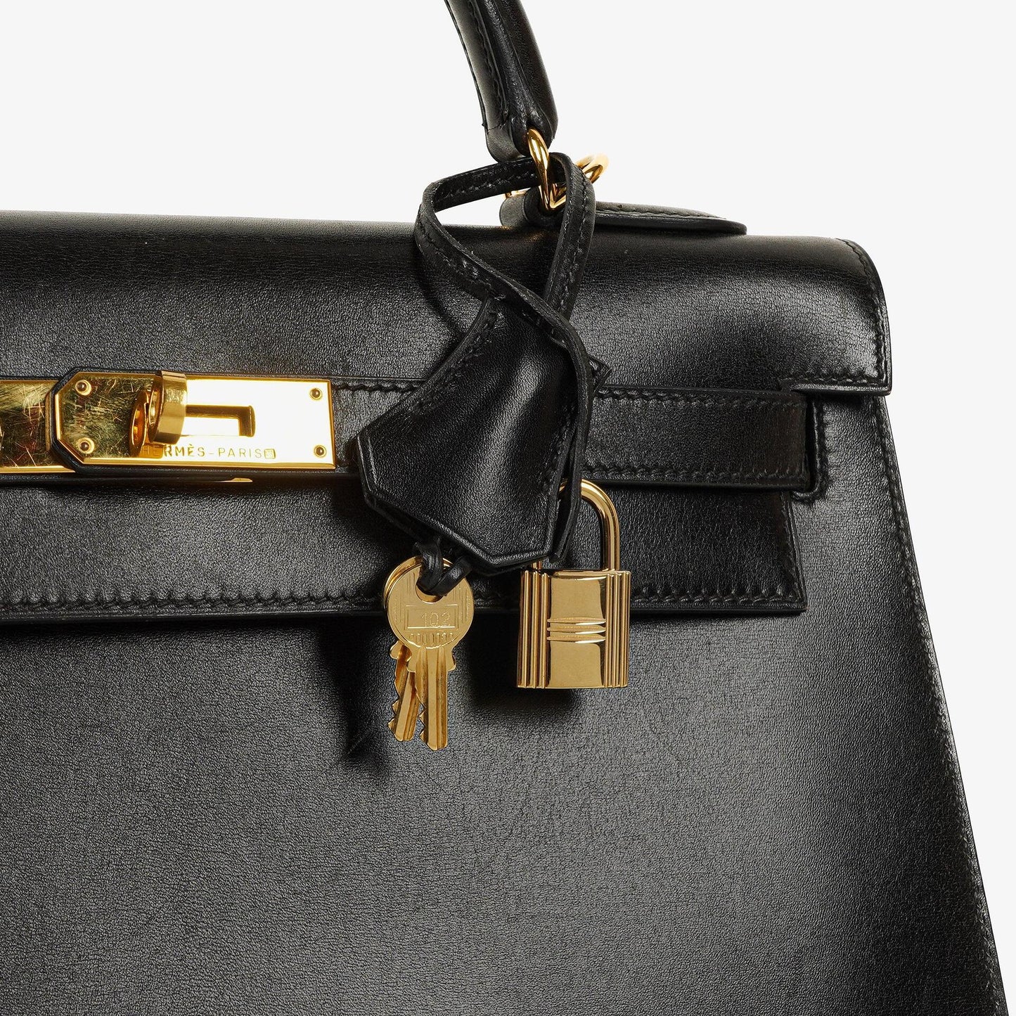 Hermès Kelly 32 Sellier Vintage aus schwarzem Boxkalbsleder mit Goldbeschlägen, 2003