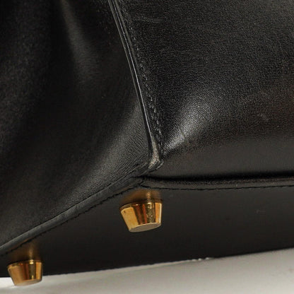 Hermès Kelly 32 Sellier Vintage aus schwarzem Boxkalbsleder mit Goldbeschlägen, 2003
