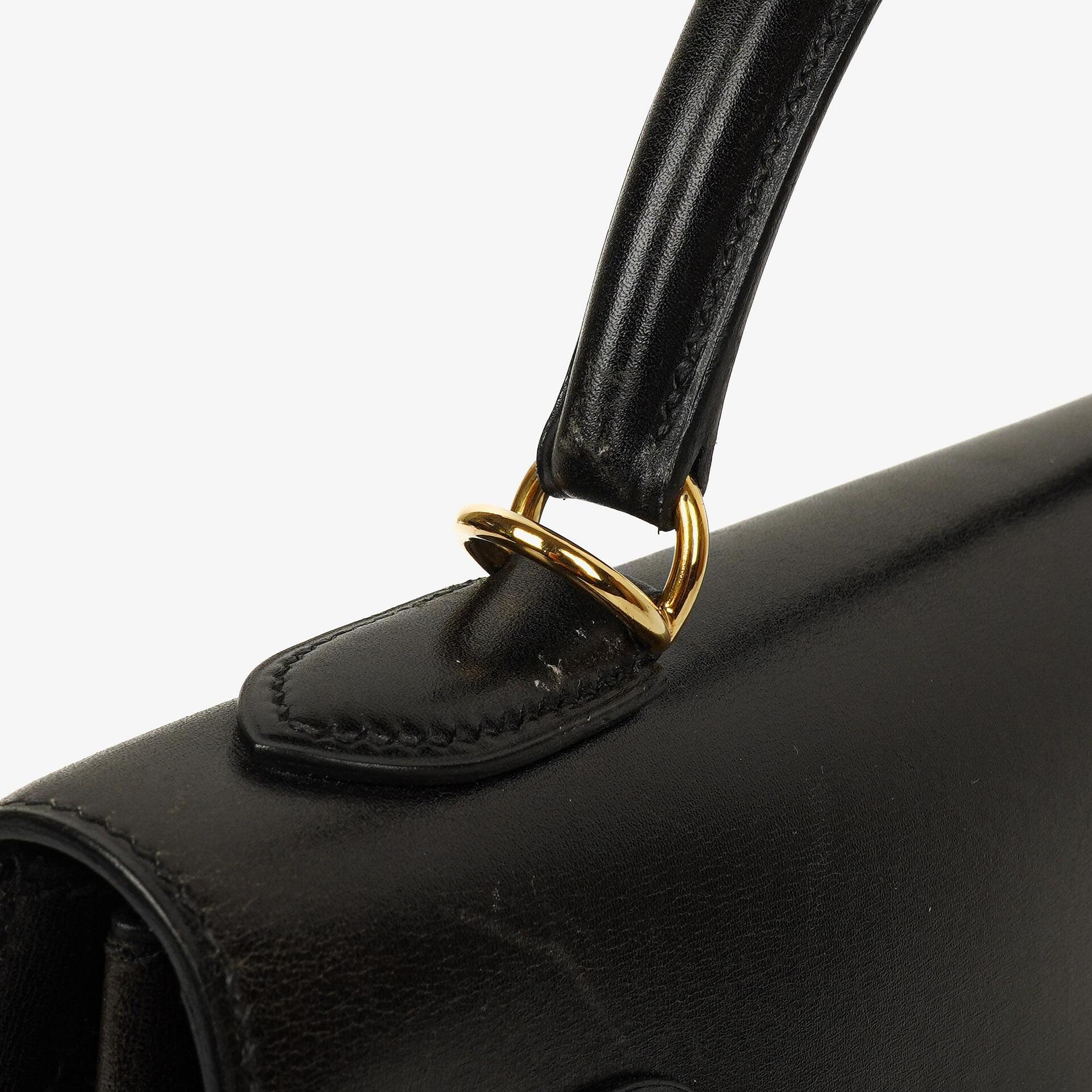Hermès Kelly 32 Sellier Vintage aus schwarzem Boxkalbsleder mit Goldbeschlägen, 2003