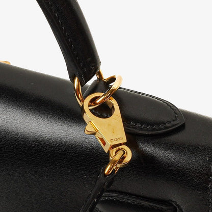 Hermès Kelly 32 Sellier Vintage aus schwarzem Boxkalbsleder mit Goldbeschlägen, 2003