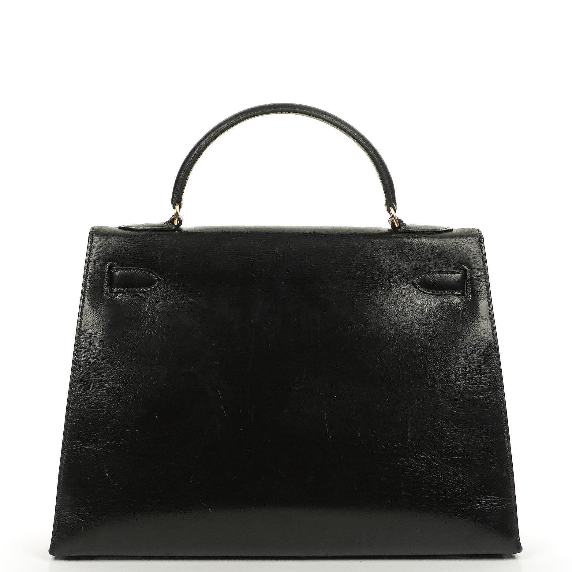 Hermès Kelly 32 Vintage Sellier aus schwarzem Boxcalf mit goldfarbener Hardware, 1987