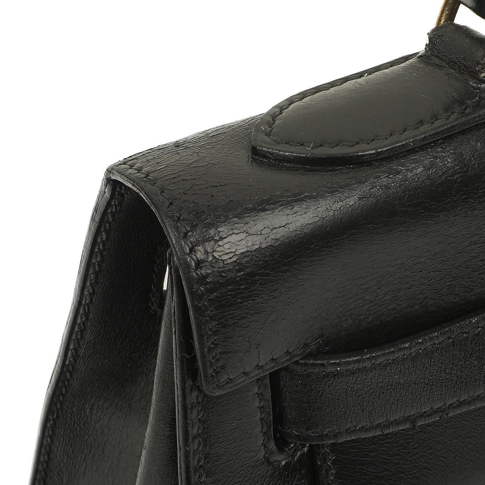 Hermès Kelly 32 Vintage Sellier aus schwarzem Boxcalf mit goldfarbener Hardware, 1987