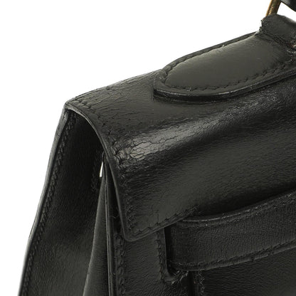 Hermès Kelly 32 Vintage Sellier aus schwarzem Boxcalf mit goldfarbener Hardware, 1987