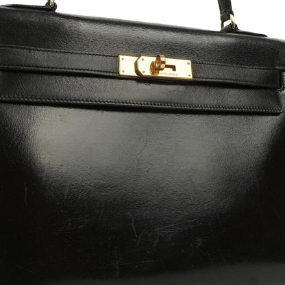 Hermès Kelly 32 Vintage Sellier aus schwarzem Boxcalf mit goldfarbener Hardware, 1987