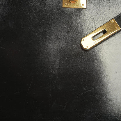 Hermès Kelly 32 Vintage Sellier aus schwarzem Boxcalf mit goldfarbener Hardware, 1987