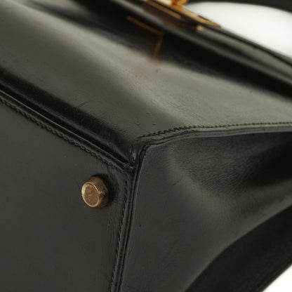 Hermès Kelly 32 Vintage Sellier aus schwarzem Boxcalf mit goldfarbener Hardware, 1987