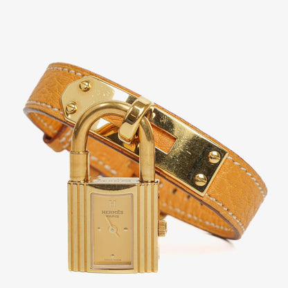 Hermès Kelly Uhr mit beigem Leder und Vergoldung