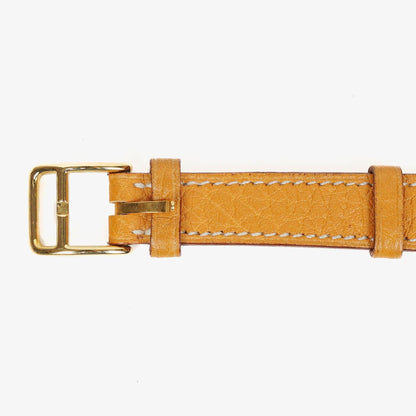Hermès Kelly Uhr mit beigem Leder und Vergoldung