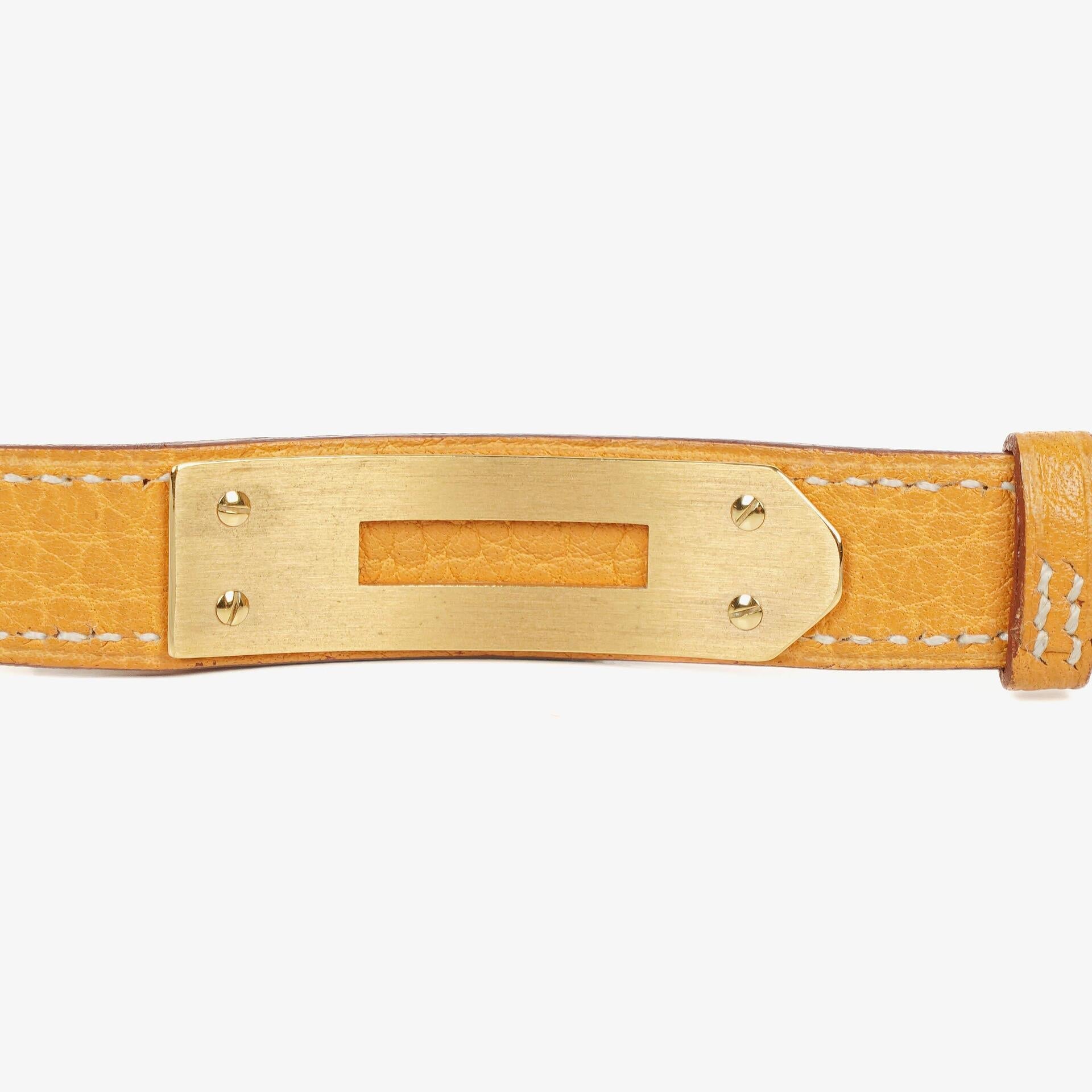 Hermès Kelly Uhr mit beigem Leder und Vergoldung