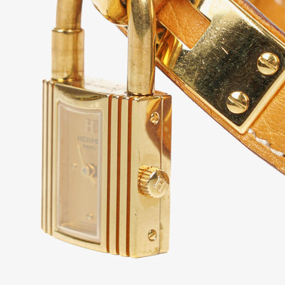 Hermès Kelly Uhr mit beigem Leder und Vergoldung