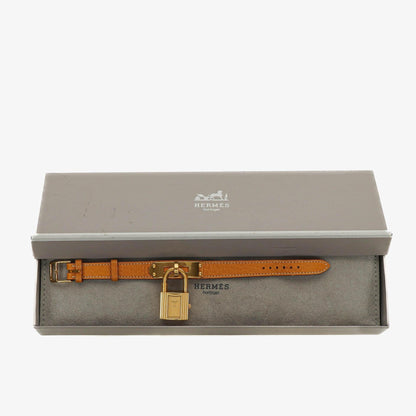 Hermès Kelly Uhr mit beigem Leder und Vergoldung
