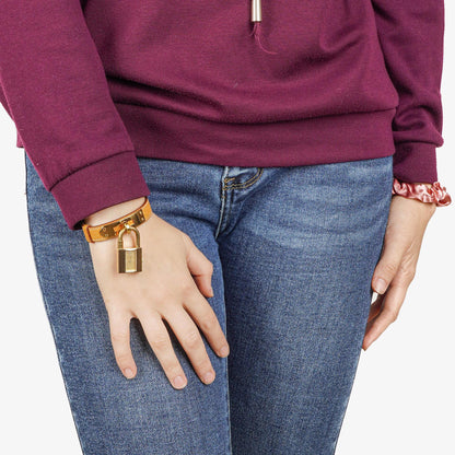 Hermès Kelly Uhr mit beigem Leder und Vergoldung