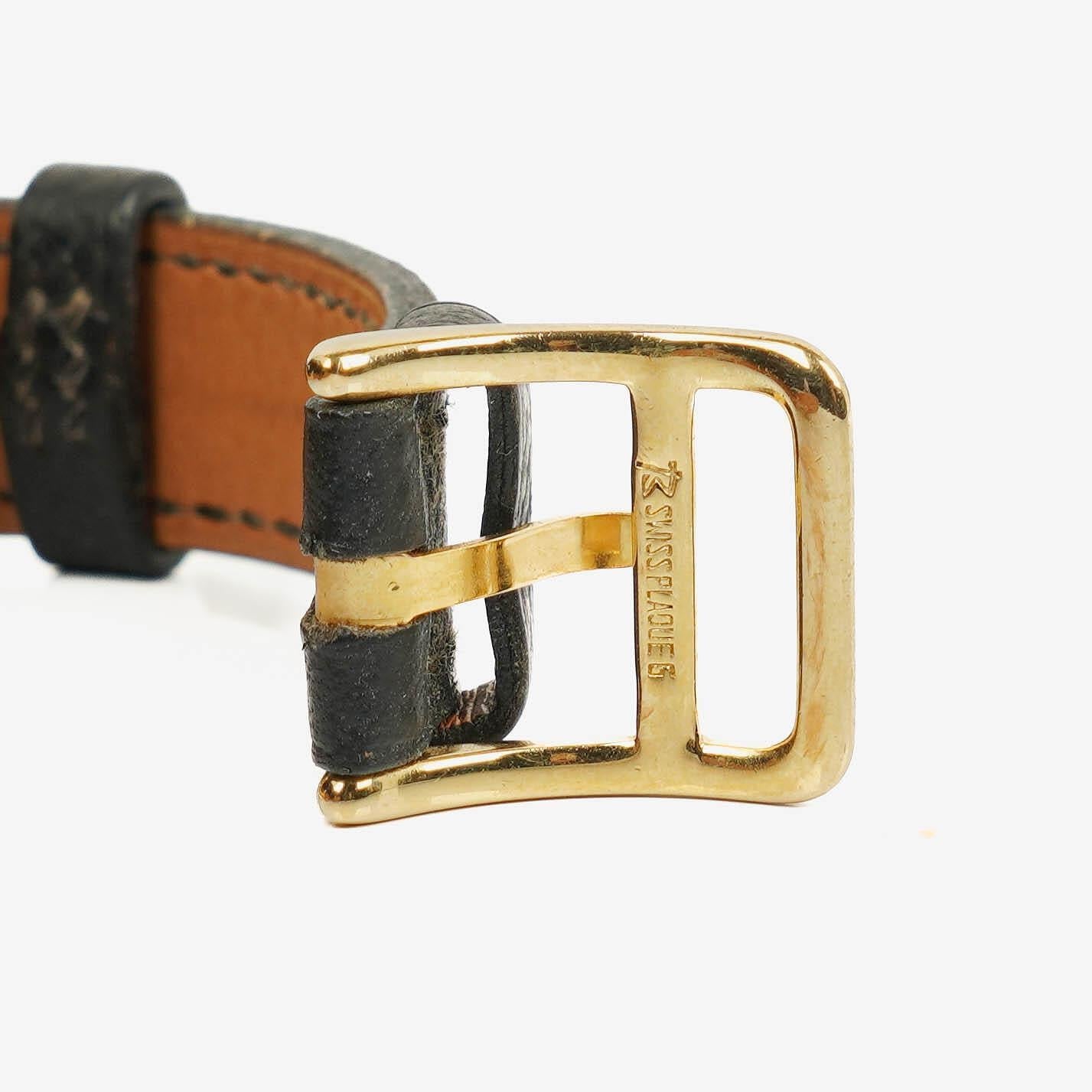 Hermès Kelly Uhr aus Courchevel-Leder mit Vergoldung