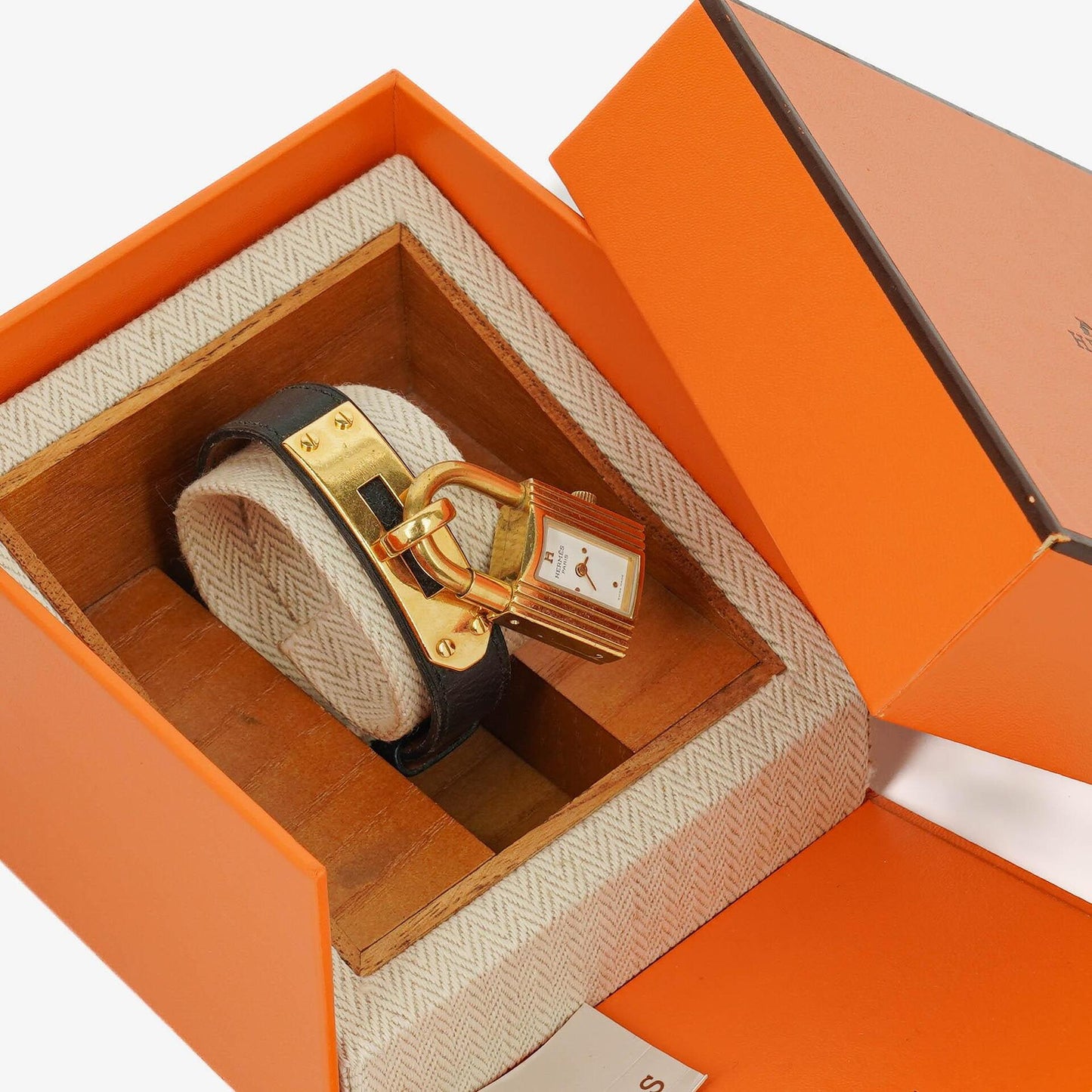 Hermès Kelly Uhr aus Courchevel-Leder mit Vergoldung