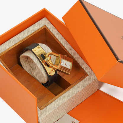Hermès Kelly Uhr aus Courchevel-Leder mit Vergoldung