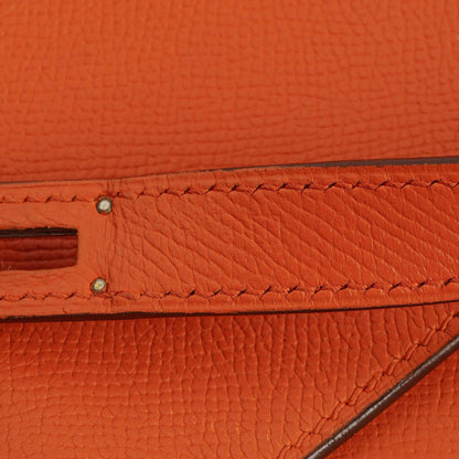 Hermès Kelly Depeche 38 Tasche aus orangefarbenem Epsom Leder