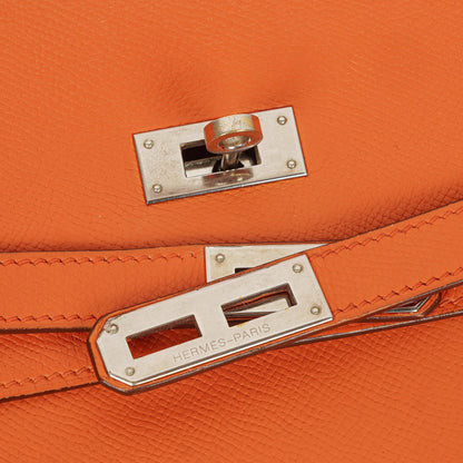 Hermès Kelly Depeche 38 Tasche aus orangefarbenem Epsom Leder