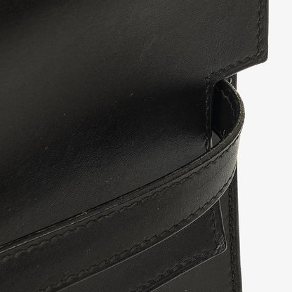 Hermès Kelly Depeches 37 aus schwarzem Boxleder mit Palladium-Beschlägen, 2003