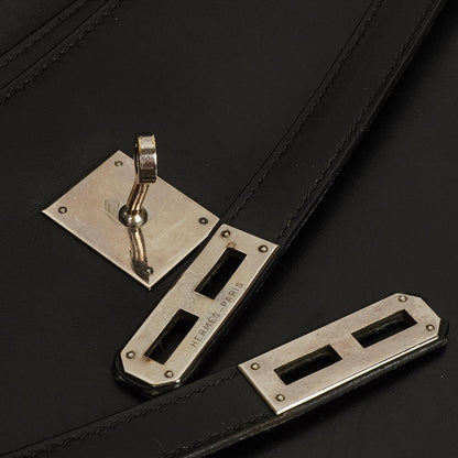 Hermès Kelly Depeches 37 aus schwarzem Boxleder mit Palladium-Beschlägen, 2003