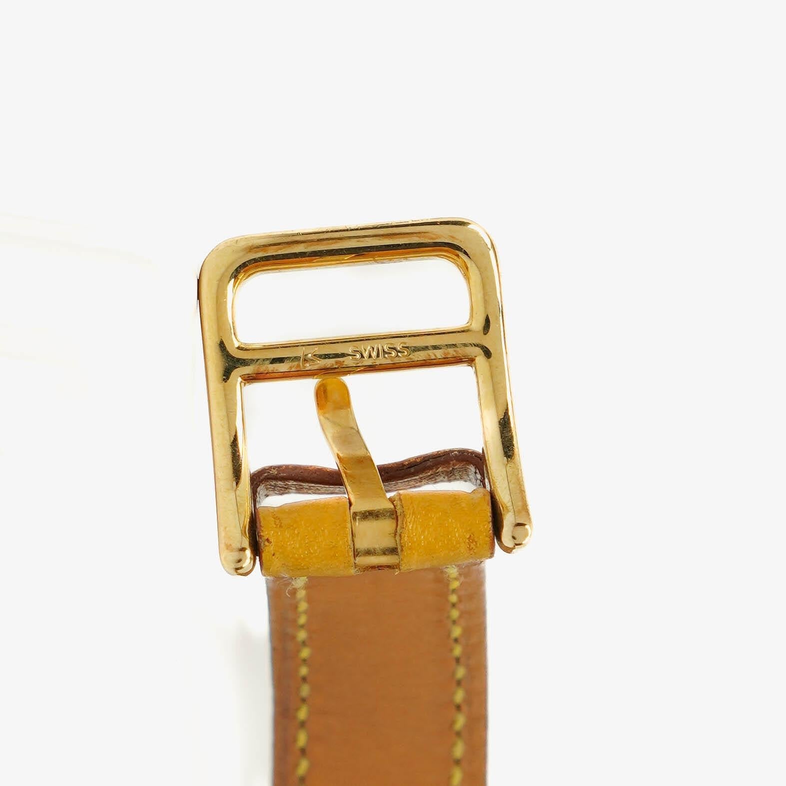 Hermès Kelly vergoldete Uhr mit Leder