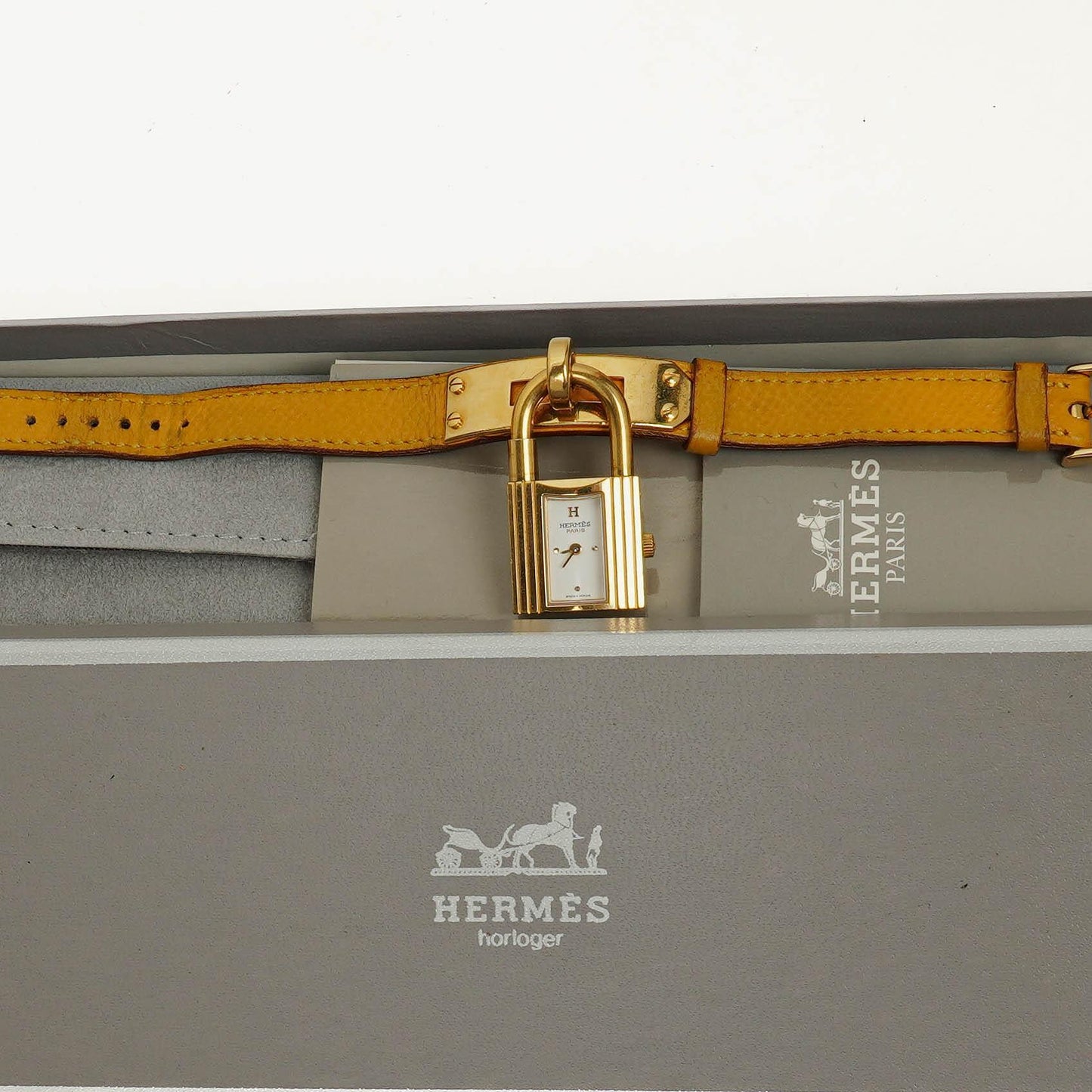 Hermès Kelly vergoldete Uhr mit Leder