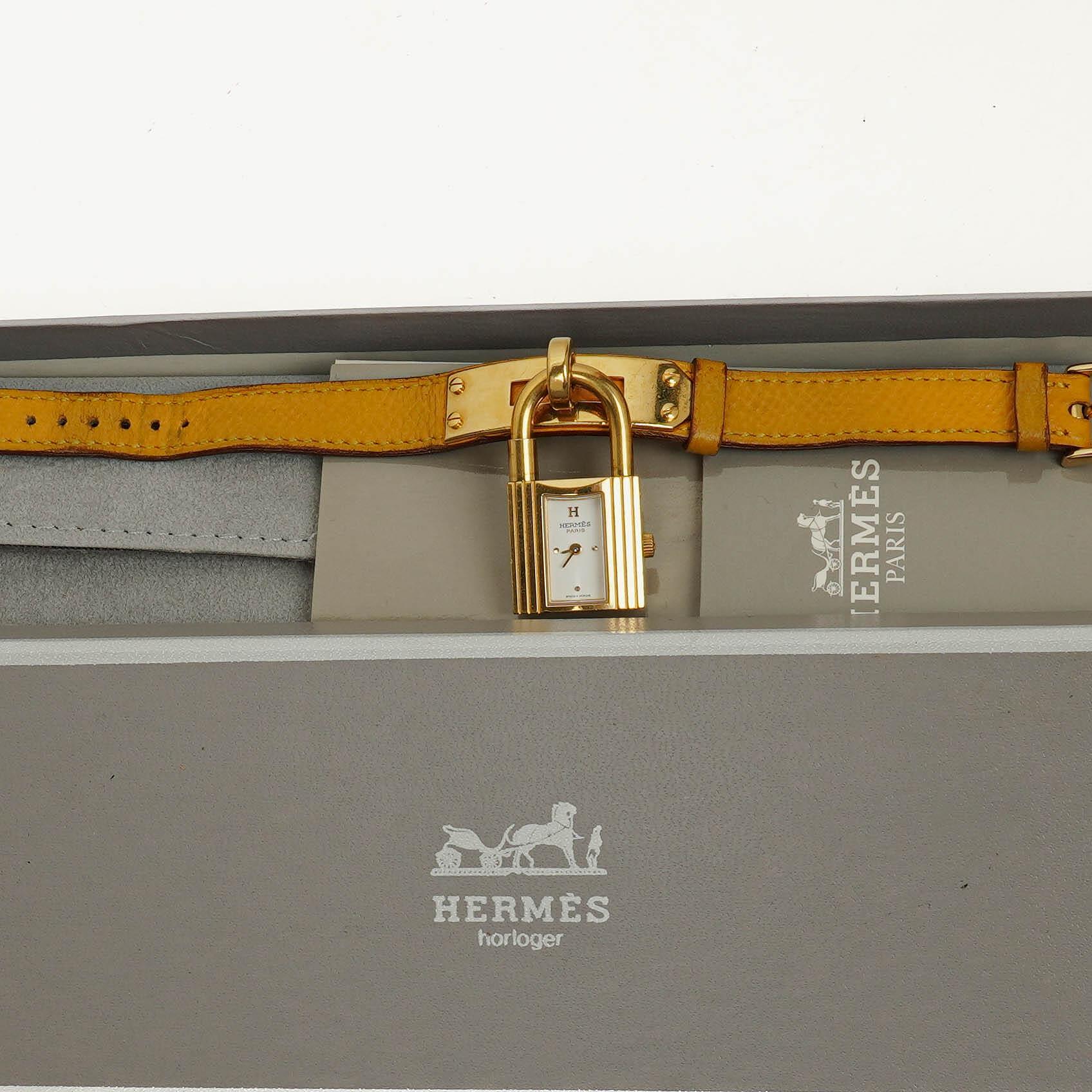 Hermès Kelly vergoldete Uhr mit Leder