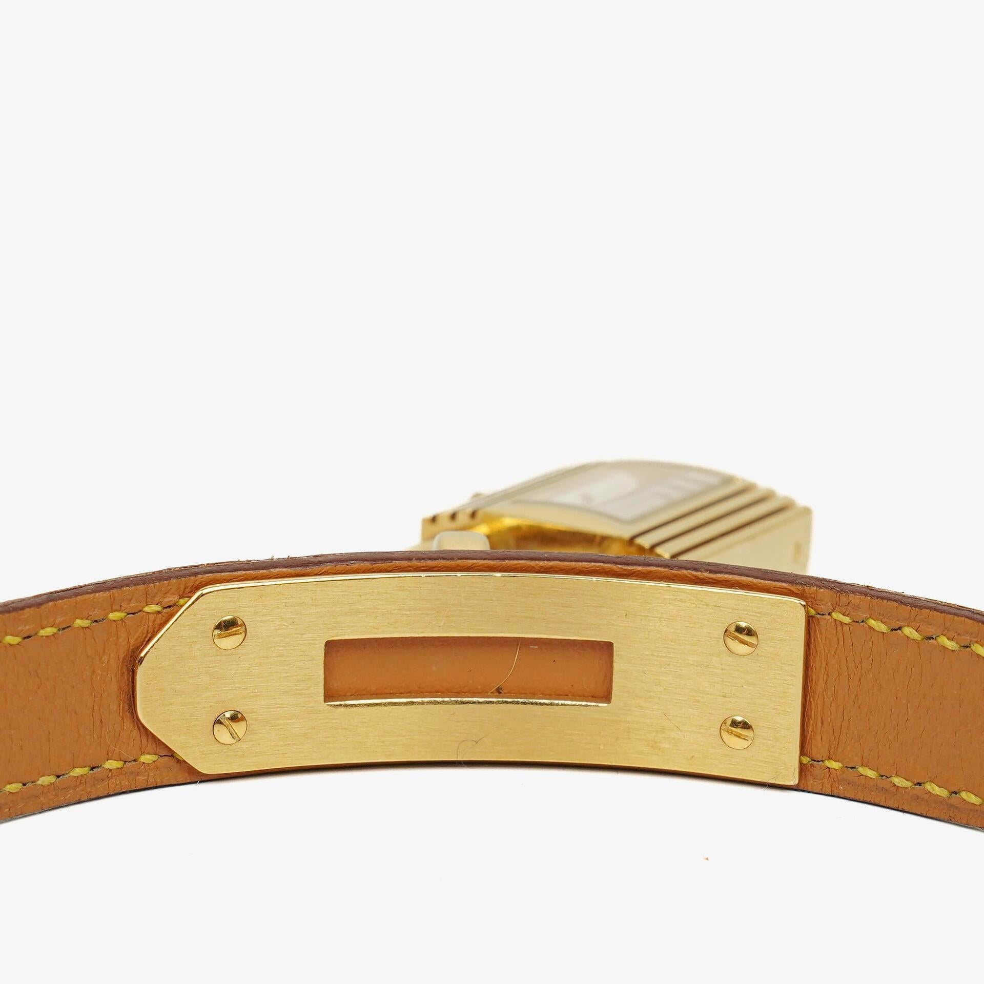 Hermès Kelly vergoldete Uhr mit Leder