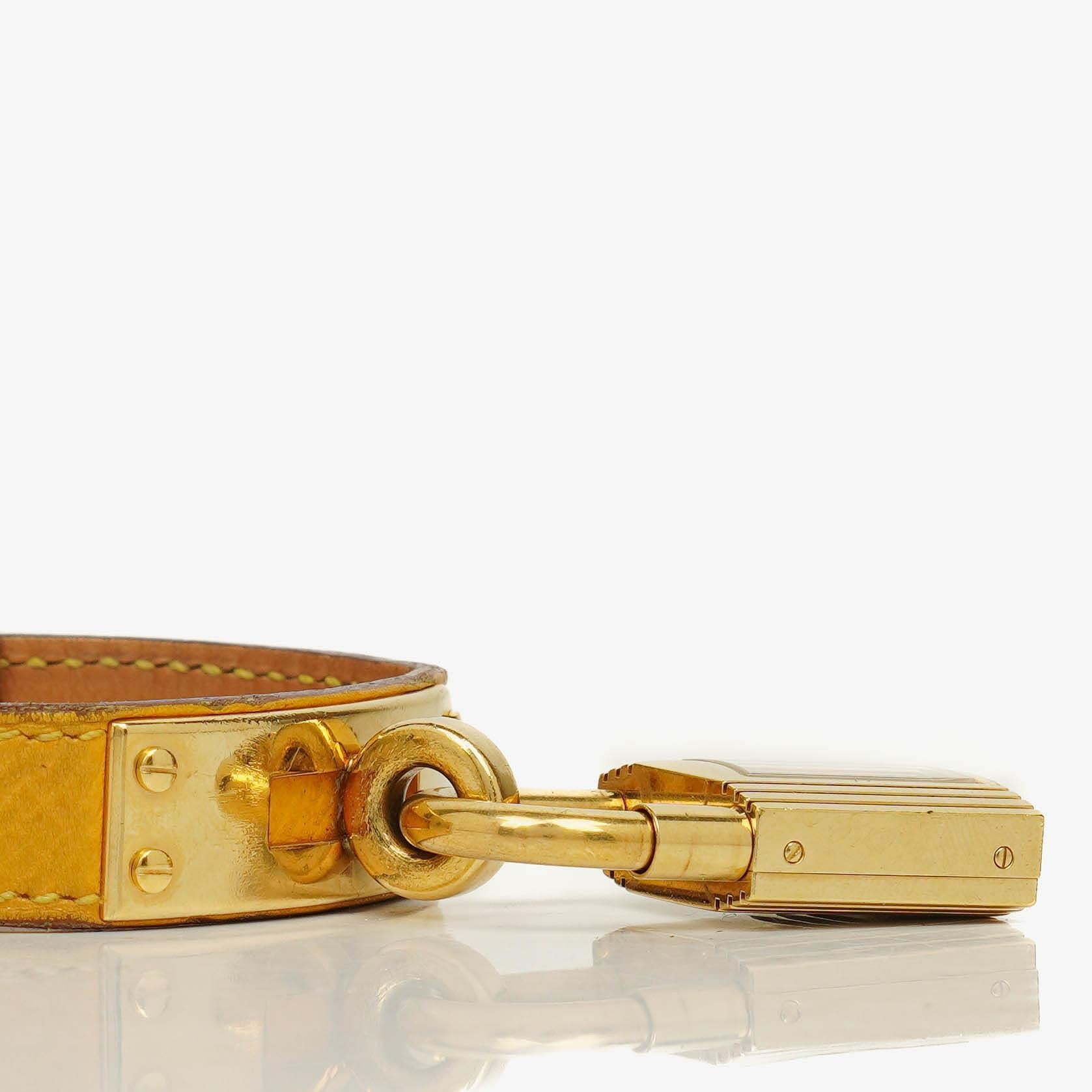 Hermès Kelly vergoldete Uhr mit Leder
