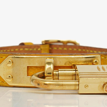 Hermès Kelly vergoldete Uhr mit Leder