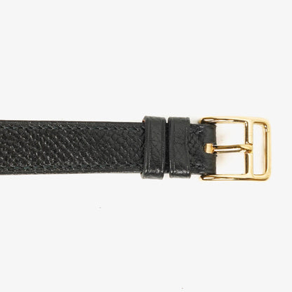 Hermès Kelly Noir Uhr aus Courchevel Leder mit Vergoldung