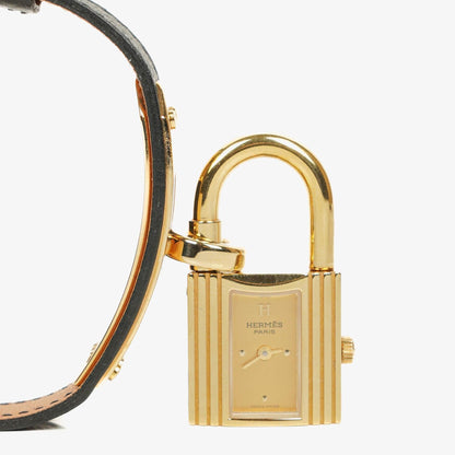 Hermès Kelly Noir Uhr aus Courchevel Leder mit Vergoldung