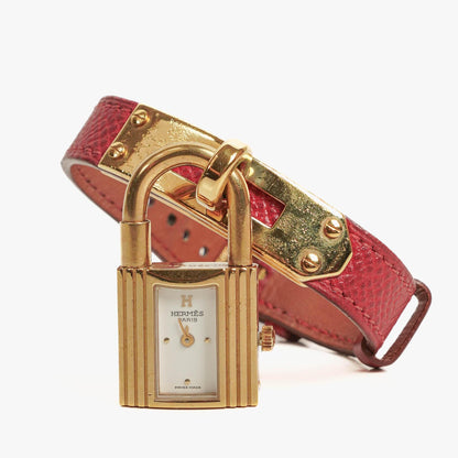Hermès Kelly Uhr aus Rouge Courchevel Leder, vergoldet