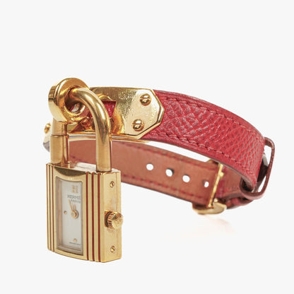 Hermès Kelly Uhr aus Rouge Courchevel Leder, vergoldet