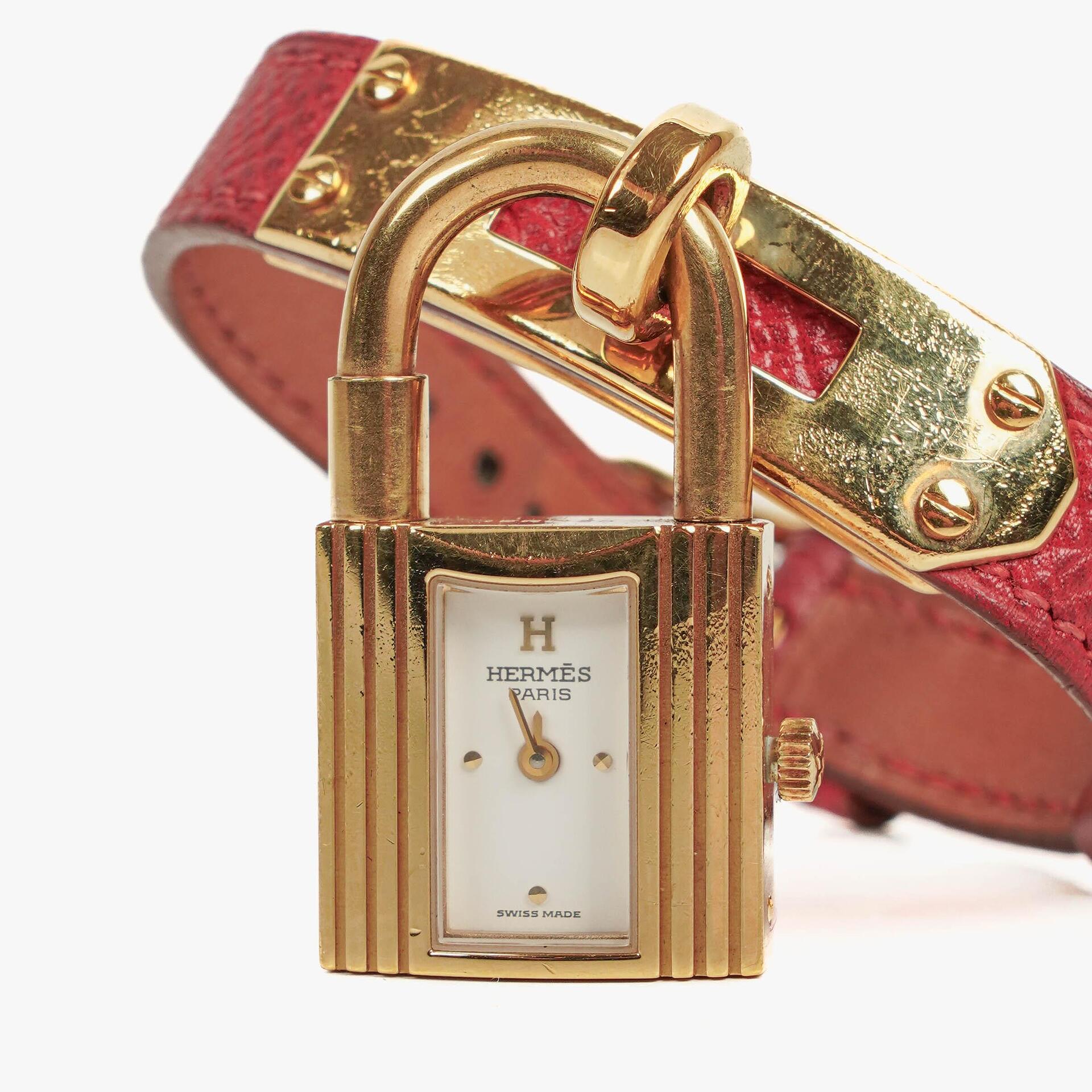 Hermès Kelly Uhr aus Rouge Courchevel Leder, vergoldet