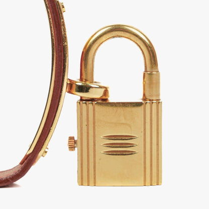 Hermès Kelly Uhr aus Rouge Courchevel Leder, vergoldet