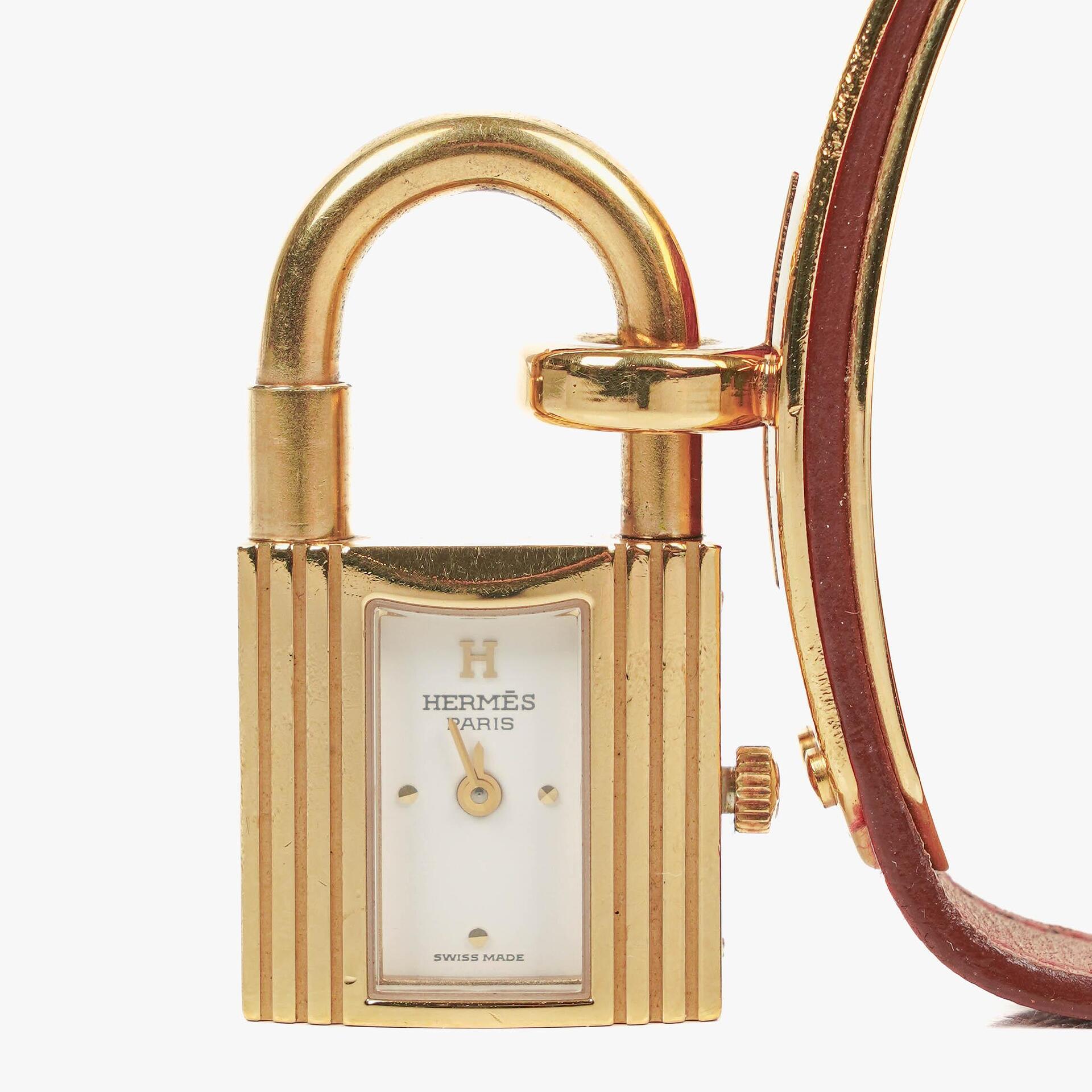 Hermès Kelly Uhr aus Rouge Courchevel Leder, vergoldet