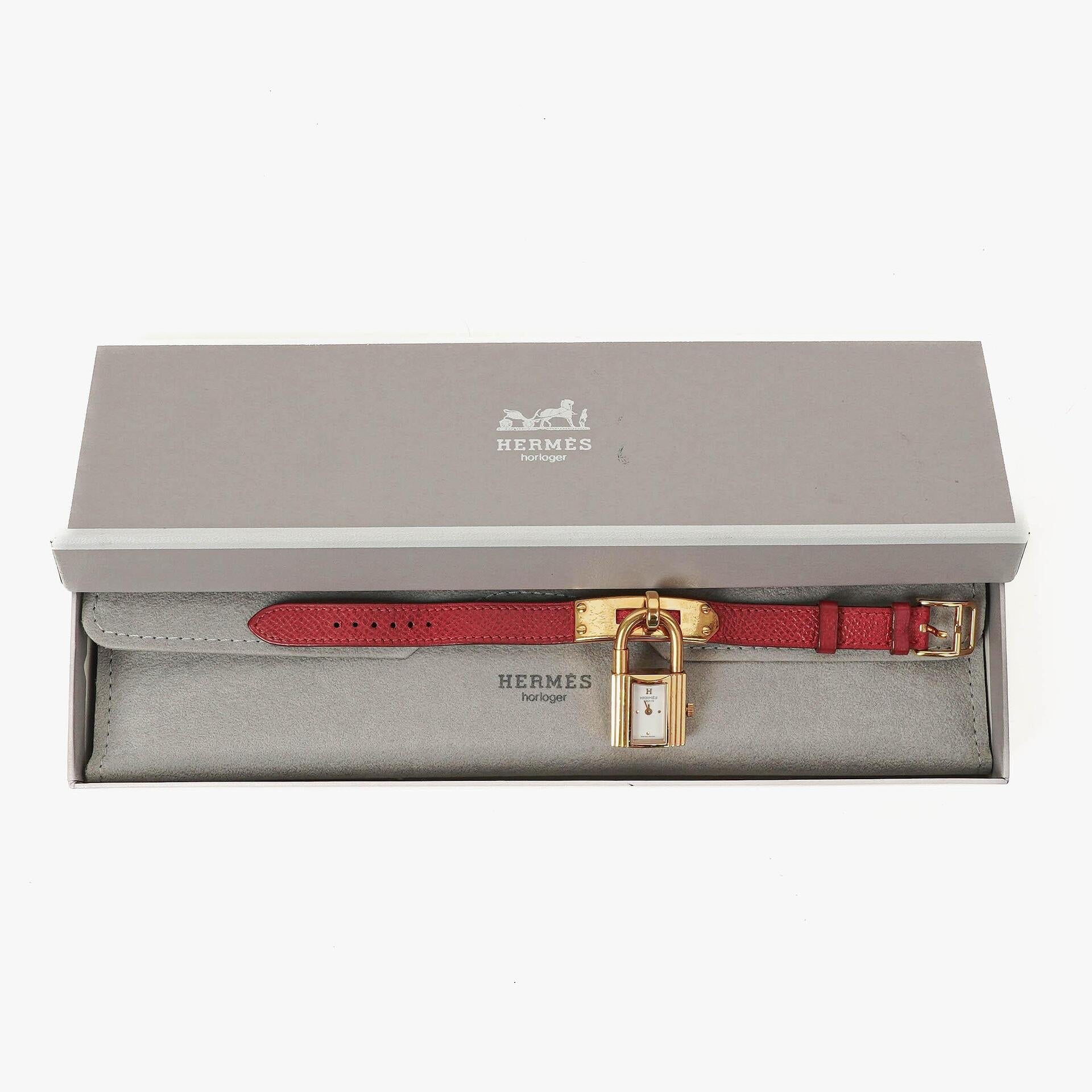 Hermès Kelly Uhr aus Rouge Courchevel Leder, vergoldet