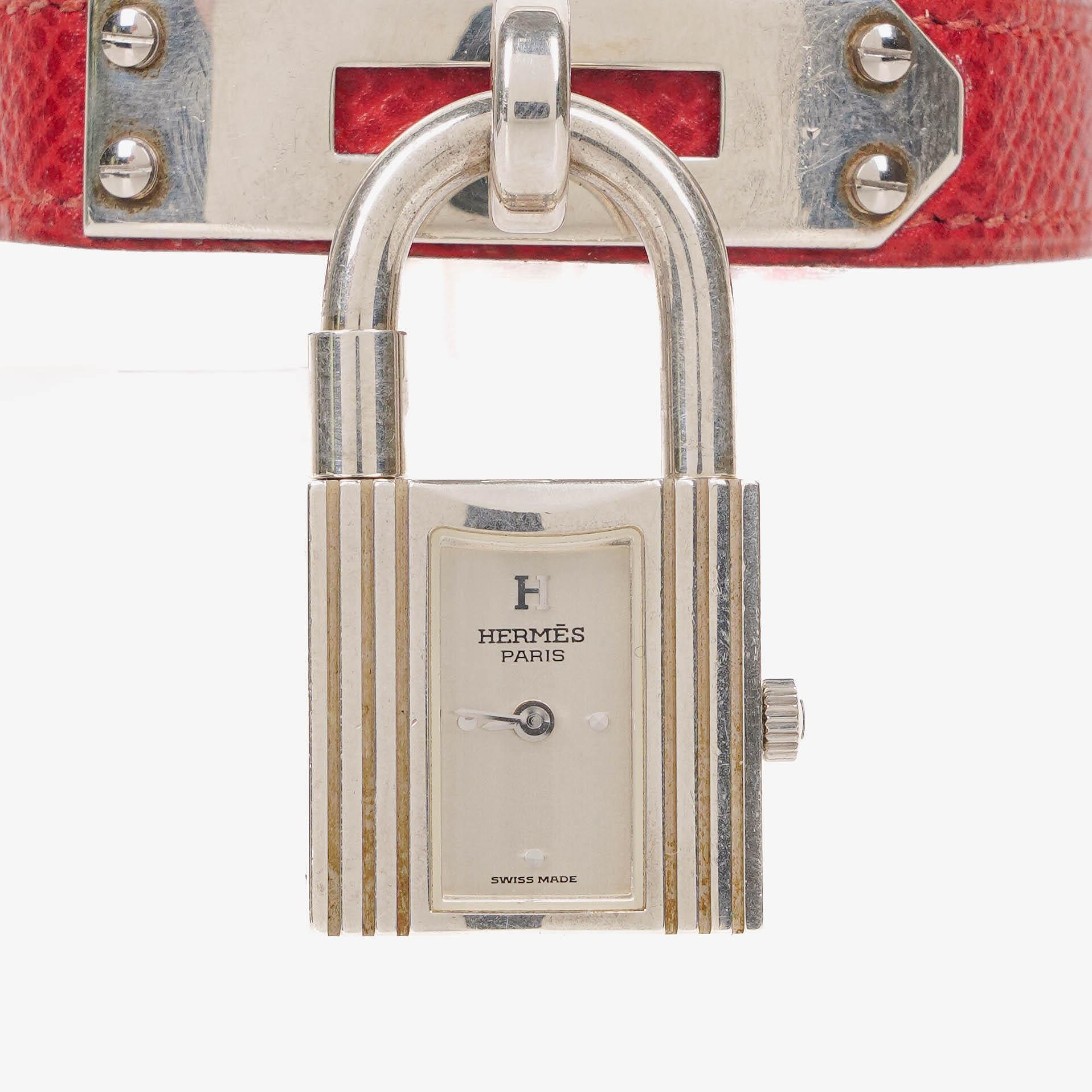 Hermès Kelly Uhr aus Rouge Courchevel Leder in Silberoptik