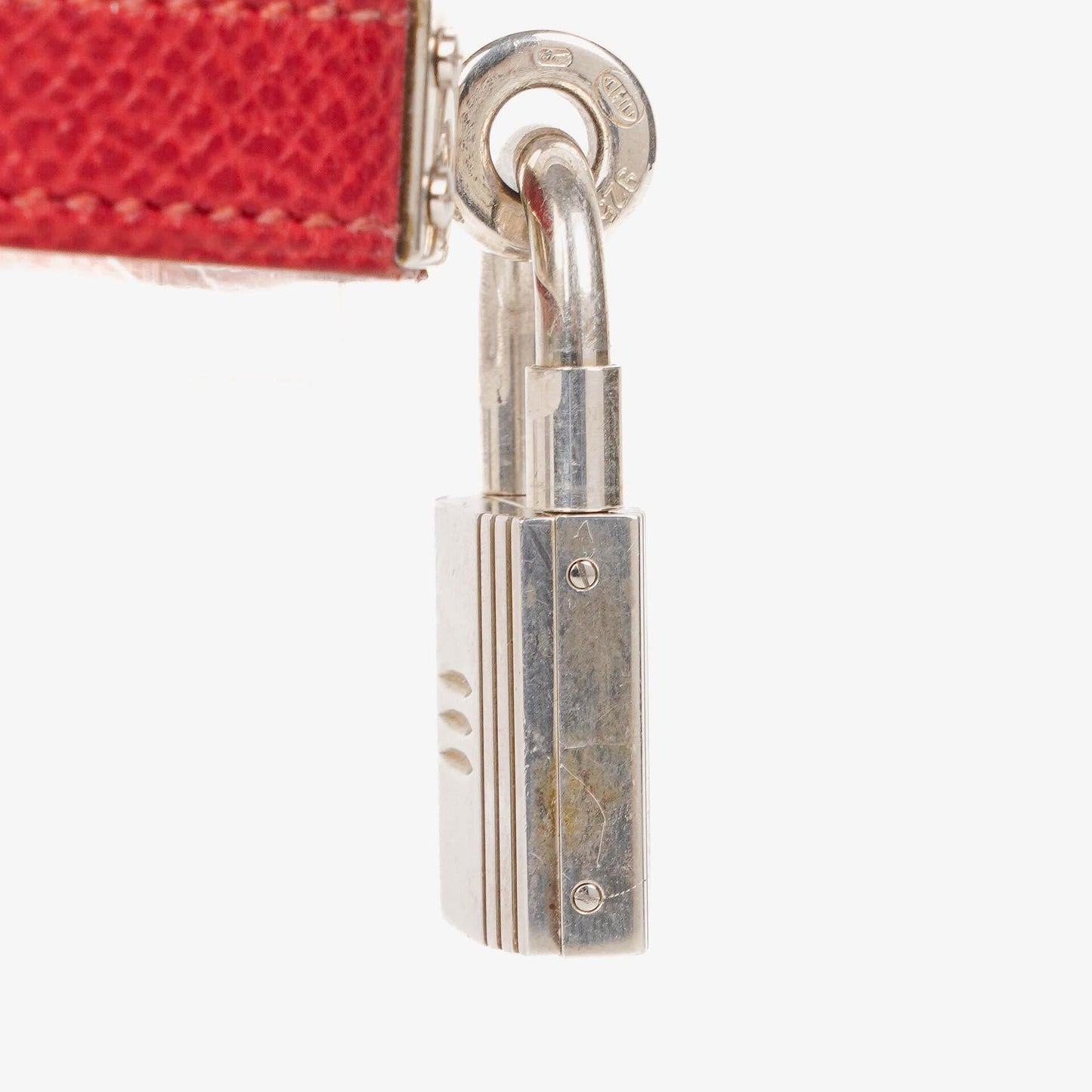 Hermès Kelly Uhr aus Rouge Courchevel Leder in Silberoptik